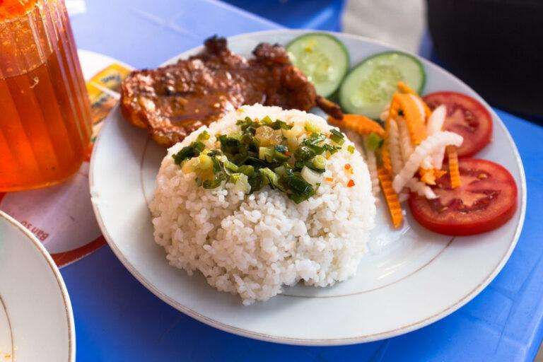 Vietnamese rice served with grilled pork (thịt nướng) and fish sauce (nước mắm).